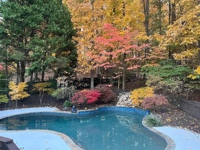 Fall is in the air, and this home frames the season on Woodmont Golf and Country Club in Georgia - for sale on GolfHomes.com, golf home, golf lot