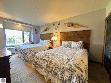 Fully furnished corner unit at the Lodge at Cedar River Village on Cedar River Golf Course in Michigan - for sale on GolfHomes.com, golf home, golf lot