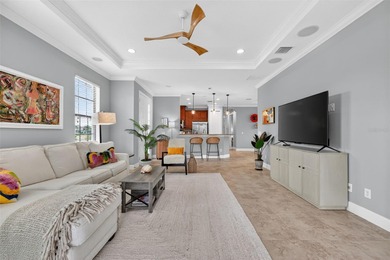 MAINTENANCE-FREE ELEGANCE WITH POND VIEWS! Welcome to your on Esplanade Golf and Country at Lakewood Ranch in Florida - for sale on GolfHomes.com, golf home, golf lot