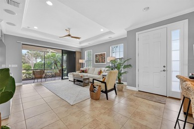 MAINTENANCE-FREE ELEGANCE WITH POND VIEWS! Welcome to your on Esplanade Golf and Country at Lakewood Ranch in Florida - for sale on GolfHomes.com, golf home, golf lot