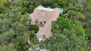 This stunning three-bedroom, 3.5 bath home, designed by the on The Oaks Club in Florida - for sale on GolfHomes.com, golf home, golf lot