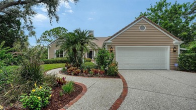 This stunning three-bedroom, 3.5 bath home, designed by the on The Oaks Club in Florida - for sale on GolfHomes.com, golf home, golf lot