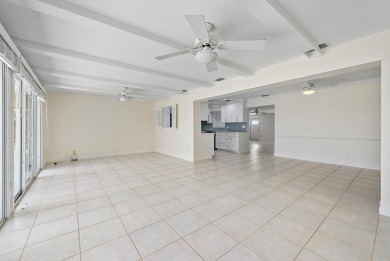 Live the waterfront lifestyle you've always dreamed of! This on Leisureville Community Golf Course in Florida - for sale on GolfHomes.com, golf home, golf lot