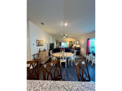 This MOVE- IN READY, LIKE NEW, WATERFRONT home, built in 2022 is on Grand Reserve Golf Course in Florida - for sale on GolfHomes.com, golf home, golf lot