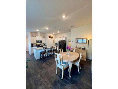 This MOVE- IN READY, LIKE NEW, WATERFRONT home, built in 2022 is on Grand Reserve Golf Course in Florida - for sale on GolfHomes.com, golf home, golf lot