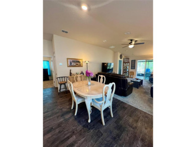This MOVE- IN READY, LIKE NEW, WATERFRONT home, built in 2022 is on Grand Reserve Golf Course in Florida - for sale on GolfHomes.com, golf home, golf lot