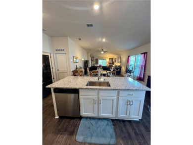This MOVE- IN READY, LIKE NEW, WATERFRONT home, built in 2022 is on Grand Reserve Golf Course in Florida - for sale on GolfHomes.com, golf home, golf lot