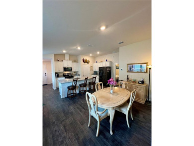 This MOVE- IN READY, LIKE NEW, WATERFRONT home, built in 2022 is on Grand Reserve Golf Course in Florida - for sale on GolfHomes.com, golf home, golf lot