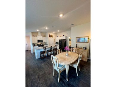 This MOVE- IN READY, LIKE NEW, WATERFRONT home, built in 2022 is on Grand Reserve Golf Course in Florida - for sale on GolfHomes.com, golf home, golf lot