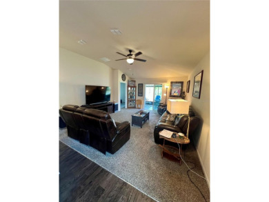 This MOVE- IN READY, LIKE NEW, WATERFRONT home, built in 2022 is on Grand Reserve Golf Course in Florida - for sale on GolfHomes.com, golf home, golf lot