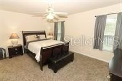 This MOVE- IN READY, LIKE NEW, WATERFRONT home, built in 2022 is on Grand Reserve Golf Course in Florida - for sale on GolfHomes.com, golf home, golf lot
