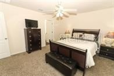This MOVE- IN READY, LIKE NEW, WATERFRONT home, built in 2022 is on Grand Reserve Golf Course in Florida - for sale on GolfHomes.com, golf home, golf lot