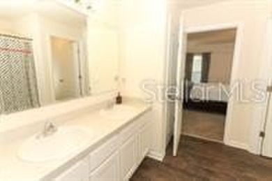 This MOVE- IN READY, LIKE NEW, WATERFRONT home, built in 2022 is on Grand Reserve Golf Course in Florida - for sale on GolfHomes.com, golf home, golf lot