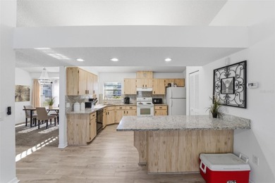 One or more photo(s) has been virtually staged. Step inside and on Oak Hills Country Club in Florida - for sale on GolfHomes.com, golf home, golf lot