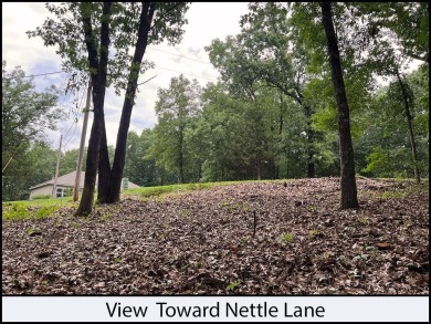 Nettle Lane is just blocks from the paved Razorback Greenway on Bella Vista - Metfield Golf Complex and Country Club in Arkansas - for sale on GolfHomes.com, golf home, golf lot