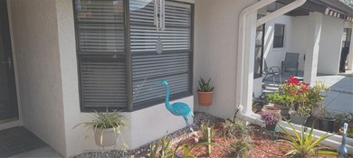 Welcome to your resort style retreat! This bright and airy 2/2/1 on Seven Springs Golf and Country Club in Florida - for sale on GolfHomes.com, golf home, golf lot