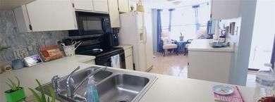 Welcome to your resort style retreat! This bright and airy 2/2/1 on Seven Springs Golf and Country Club in Florida - for sale on GolfHomes.com, golf home, golf lot