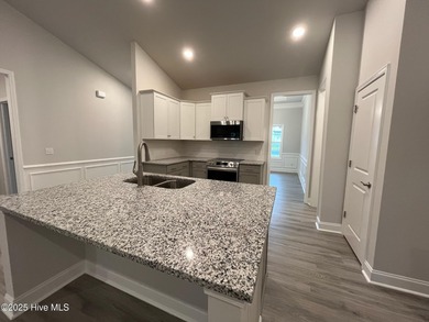 Ready Now! This beautiful new home in Palmetto Creek has a pond on Lennon Hills Golf Course in North Carolina - for sale on GolfHomes.com, golf home, golf lot