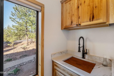Beautiful corner lot cabin in Show Low's Torreon Golf community on Torreon Golf Club in Arizona - for sale on GolfHomes.com, golf home, golf lot