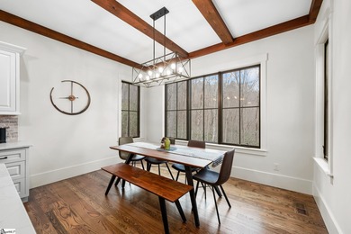 Built in 2023, this exceptional mountain retreat is nestled on a on The Cliffs at Glassy Golf and Country Club in South Carolina - for sale on GolfHomes.com, golf home, golf lot