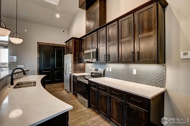 The Avalon by Landmark Homes offers lock & leave, unparalleled on Highland Meadows Golf Course in Colorado - for sale on GolfHomes.com, golf home, golf lot