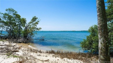 Lakefront unit in lovely Inlet Village in I R P boasts new light on Ocean Club At the Hutchinson Island Beach Resort and Marina in Florida - for sale on GolfHomes.com, golf home, golf lot