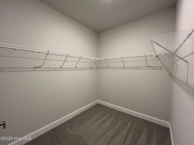 Ready Now! This beautiful new home in Palmetto Creek has a pond on Lennon Hills Golf Course in North Carolina - for sale on GolfHomes.com, golf home, golf lot