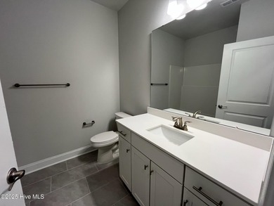 Ready Now! This beautiful new home in Palmetto Creek has a pond on Lennon Hills Golf Course in North Carolina - for sale on GolfHomes.com, golf home, golf lot