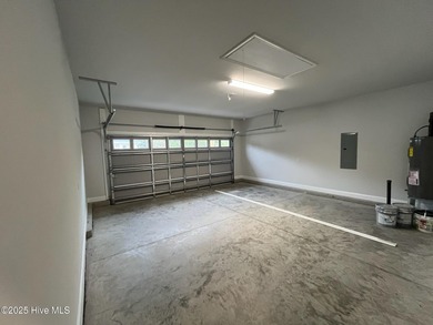 Ready Now! This beautiful new home in Palmetto Creek has a pond on Lennon Hills Golf Course in North Carolina - for sale on GolfHomes.com, golf home, golf lot