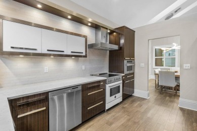 Step into this stunning home, where elegance and modern design on Boca Delray Golf and Country Club in Florida - for sale on GolfHomes.com, golf home, golf lot