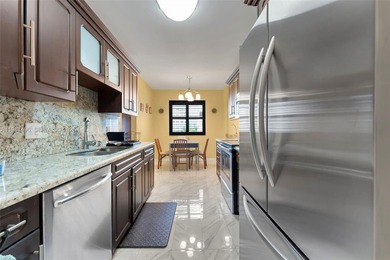 Beautifully updated 2-bed, 2-bath condo in an all-ages on Hillcrest Golf and Country Club in Florida - for sale on GolfHomes.com, golf home, golf lot