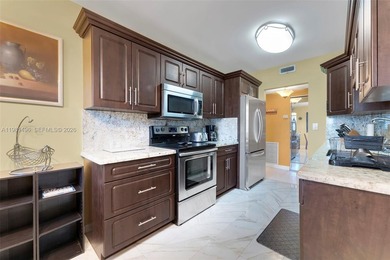 Beautifully updated 2-bed, 2-bath condo in an all-ages on Hillcrest Golf and Country Club in Florida - for sale on GolfHomes.com, golf home, golf lot