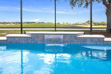 POOL HOME with SPECTACULAR GOLF COURSE on this 3/2 GARDENIA with on Bonita Pass Executive Golf Course in Florida - for sale on GolfHomes.com, golf home, golf lot