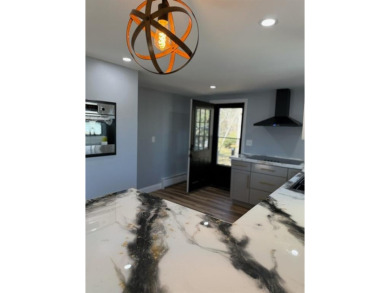 Discover Your Potowomut/Bay Ridge Dream Home 1 minute away from on Potowomut Golf Club in Rhode Island - for sale on GolfHomes.com, golf home, golf lot