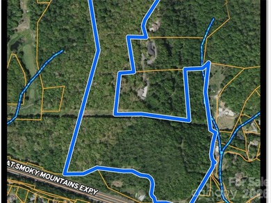 This large tract of land was a part of the original Reinertson on Laurel Ridge Country Club in North Carolina - for sale on GolfHomes.com, golf home, golf lot