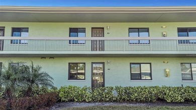 Move right into this beautifully updated first-floor condo on East Lake Woodlands Country Club in Florida - for sale on GolfHomes.com, golf home, golf lot