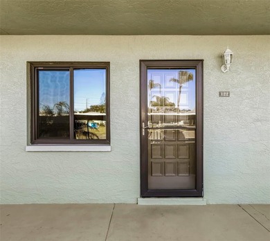 Move right into this beautifully updated first-floor condo on East Lake Woodlands Country Club in Florida - for sale on GolfHomes.com, golf home, golf lot