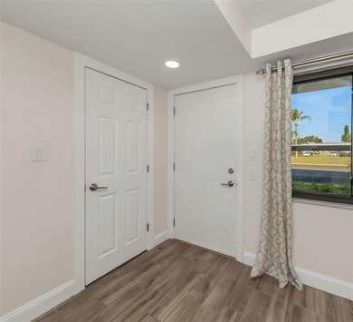 Move right into this beautifully updated first-floor condo on East Lake Woodlands Country Club in Florida - for sale on GolfHomes.com, golf home, golf lot