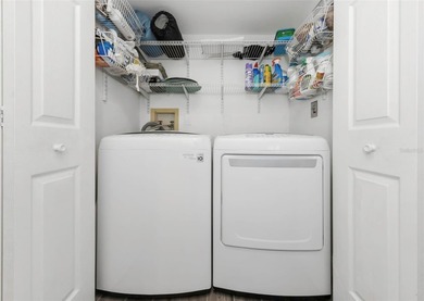 Move right into this beautifully updated first-floor condo on East Lake Woodlands Country Club in Florida - for sale on GolfHomes.com, golf home, golf lot