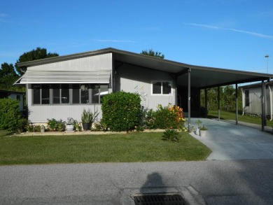 1985 Ventura 26x48 has been updated with double pane windows on Grasslands Golf and Country Club in Florida - for sale on GolfHomes.com, golf home, golf lot