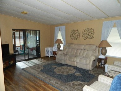 1985 Ventura 26x48 has been updated with double pane windows on Grasslands Golf and Country Club in Florida - for sale on GolfHomes.com, golf home, golf lot