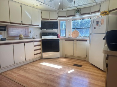 Perfect Property in Sun Air North! Discover this charming on Sun Air Golf Course in Florida - for sale on GolfHomes.com, golf home, golf lot