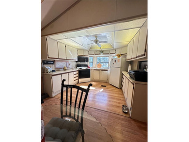 Perfect Property in Sun Air North! Discover this charming on Sun Air Golf Course in Florida - for sale on GolfHomes.com, golf home, golf lot