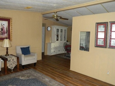 1985 Ventura 26x48 has been updated with double pane windows on Grasslands Golf and Country Club in Florida - for sale on GolfHomes.com, golf home, golf lot
