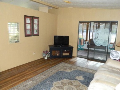 1985 Ventura 26x48 has been updated with double pane windows on Grasslands Golf and Country Club in Florida - for sale on GolfHomes.com, golf home, golf lot