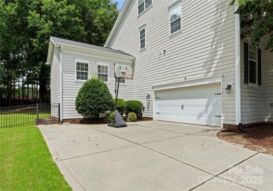 Experience luxury living in this exquisite 3 story, 6 bedroom, 4 on The Palisades Country Club in North Carolina - for sale on GolfHomes.com, golf home, golf lot