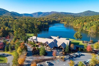 Nestled within the serene and exclusive Big Canoe community in on Big Canoe Golf Club - Cherokee in Georgia - for sale on GolfHomes.com, golf home, golf lot