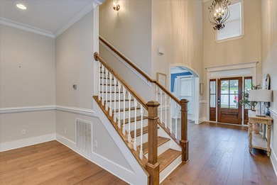 Welcome to this beautiful two-story brick home in the on Bartram Trail Golf Club in Georgia - for sale on GolfHomes.com, golf home, golf lot