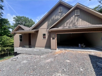 Must see new construction centrally located between Lake Ann and on Bella Vista - Metfield Golf Complex and Country Club in Arkansas - for sale on GolfHomes.com, golf home, golf lot