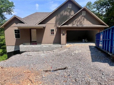 Must see new construction centrally located between Lake Ann and on Bella Vista - Metfield Golf Complex and Country Club in Arkansas - for sale on GolfHomes.com, golf home, golf lot